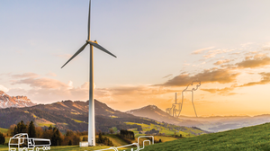 Picture of a wind power generator standing in a scenic landscape