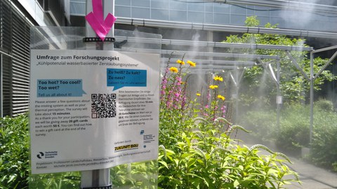 Schild an Zerstäuberanlage