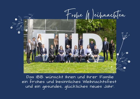 Gruppenbild der Mitarbeiter von dem Institut für Baubetriebswesen mit Weihnachtswünschen