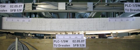 RC slab strengthened with textile reinforced concrete under bending