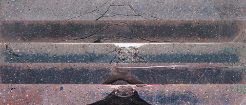 Steel reinforced concrete slabs after impact with velocities between 25 and 61 m/s