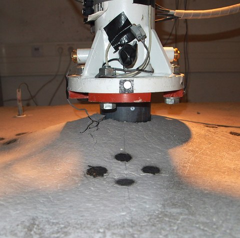 Bulging of the damping layer after an impact test of a plate at 220 km/h