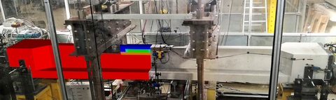 Concrete beam during fatigue loading in a resonance-based testing facility