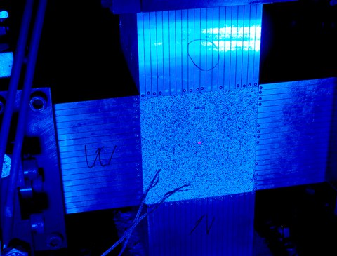 Concrete specimen with speckle pattern for DIC prepared for biaxial compressive testing