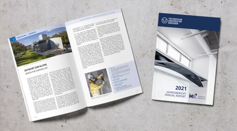 Bild zeigt den Jahresbericht 2021 (offen und geschlossen)