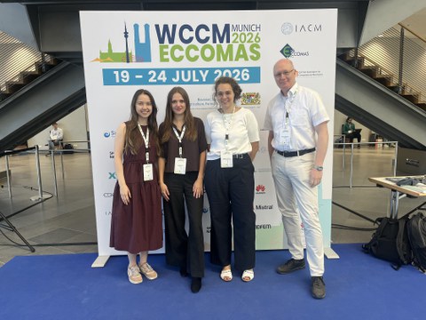 IMF representatives in front of the WCCM banner in Munich