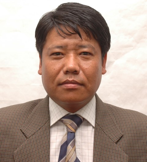 Portrait photo of Mr. Gurung