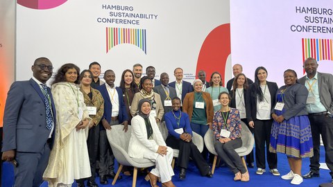 Group photo on a stage of the Hamburg Sustainability Conference