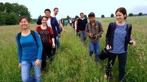 Participants walking in single file during an excursion in Upper Lusatia