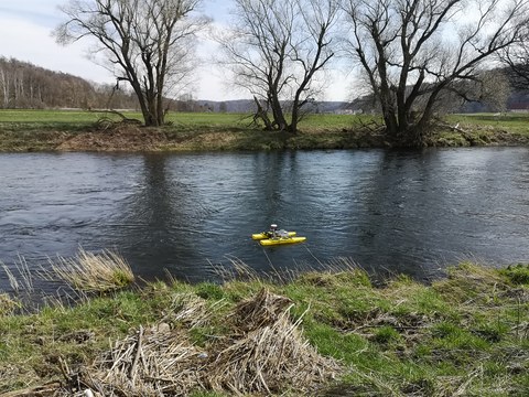 Unmanned water vehicle on a river