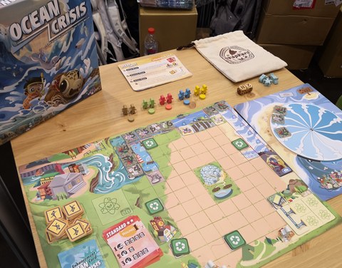 Game materials on a board game
