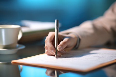 Hand mit Stift