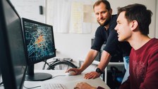 Verkehrsforschende am Computer