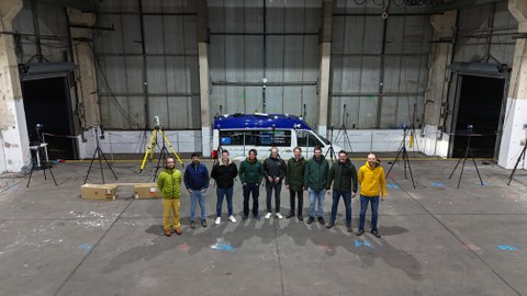 Messungen zur Positionierung im Reallabor Busdepot Torgau mit e-Crafter, beteiligten Personen und Messaufbau