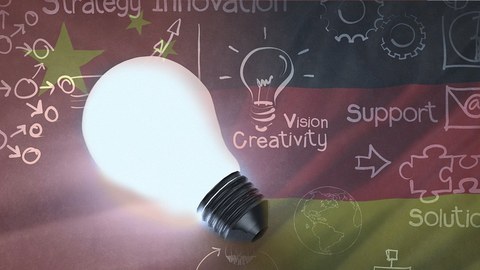 Creative presentation of a light bulb with symbols