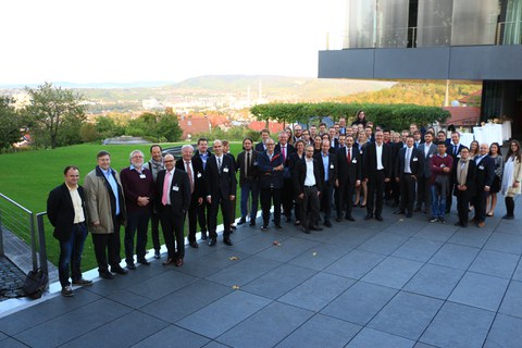 Group picture of the participants outside in front of a building.