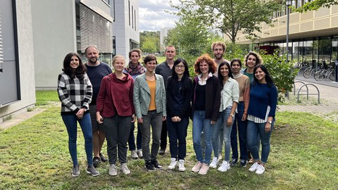 Members of Politi grup standing together outside (2022)