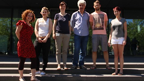 The Anastassiadis group members of 2015 standing on the stairs in front of the CRTD building main entrance
