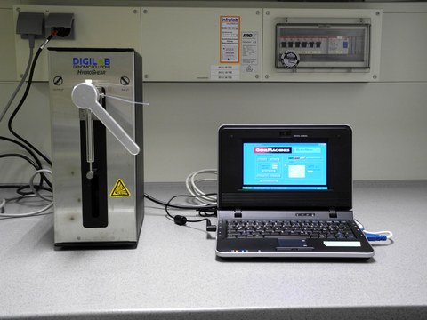 A machine which can physically shear DNA and the laptop to operate the device