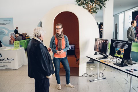 The Ader Lab's "Eye" and information stand