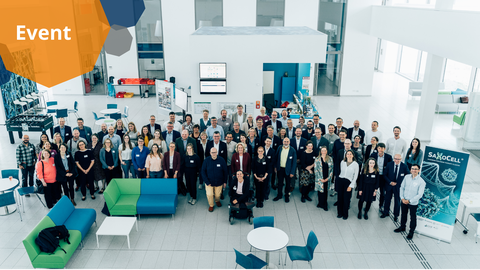 Group photo of the SaxoCell team in the foyer of the Center for Regenerative Therapies Dresden (CRTD).