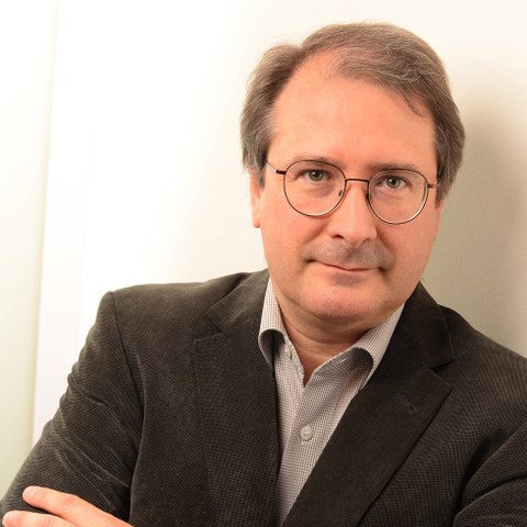 Dr. Denis Corbeil