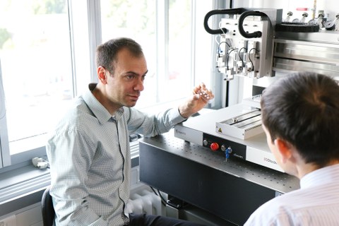 Ivan Minev in front of 3D Printer