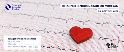 Ein Foto von einer EKG-Aufzeichnung. Auf dem Papier liegt ein rotes Herz.