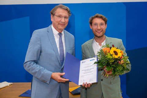 Laudator: Prof. M. Beckmann; Preistraeger - Dr. J. Manthey