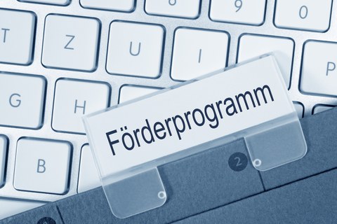 Tastatur mit Schriftzug Förderprogramme