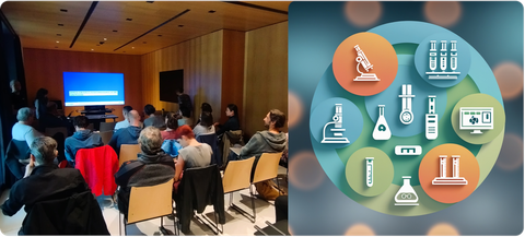 Besucher eines Workshops folgen einem Vortrag