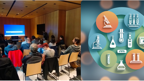 Besucher eines Workshops folgen einem Vortrag