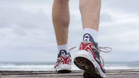 Legs with sports shoes