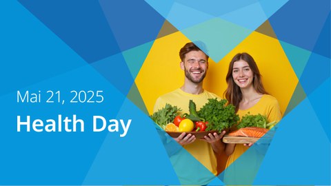 In a blue heart-shaped frame, a man and a woman are standing in front of a yellow background, both holding a jar of healthy food in their hands. On the left is the date and the name of the event “Health Day”