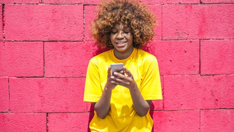 young adult looking at smartphone