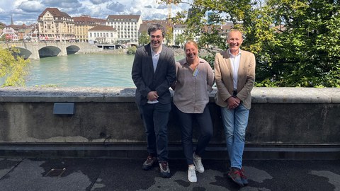 Foto zeigt Prof. Link und zwei Kollegen auf der Tagung in Basel