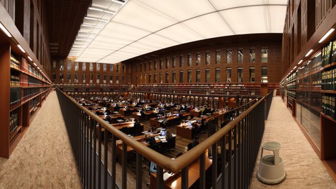 Das Foto zeigt einen Blick in den zentralen Lesesaal der Staatlichen und Universitätsbibliothek Dresden. An den Arbeitsplätzen sitzen viele Studierende.