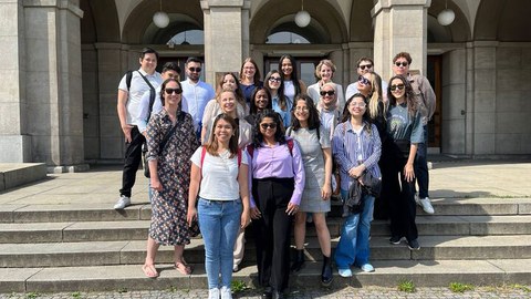 a group of people in front of a building