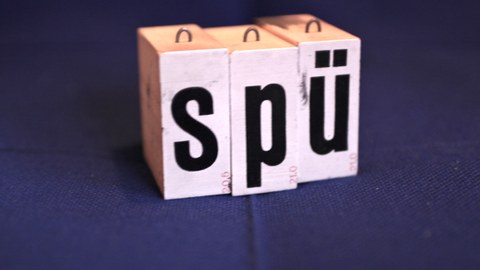 Stempelbuchstaben "SPÜ"