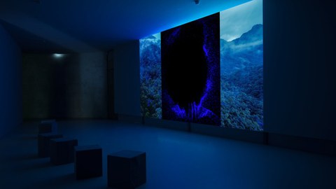   Digital landscape projection of mountains and forest in a dark room.