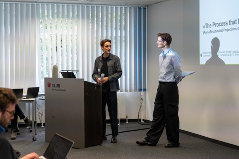 Sprecher:innen während des Symposium