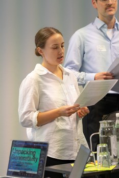 Sprecher:innen während des Symposium