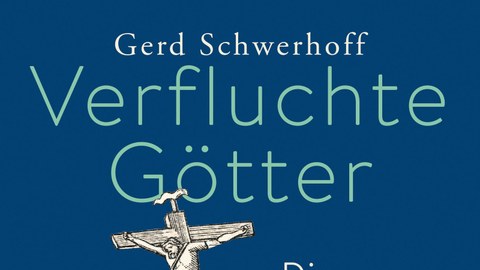 Cover des Buches Verfluchte Götter von Gerd Schwerhoff, blauer EInband mit einer gekreuzigten Figur und weiteren Figuren