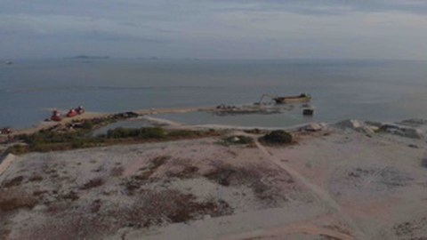 Ongoing coastal reclamation in Malacca, Malaysia. Film still White Elephant (2022