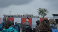 Tourguide Z. Erman mit deutscher Flagge
