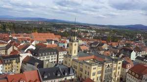 Picture with view of the city Zittau from a church tower. In the center of the picture you can see the Zittau town hall.