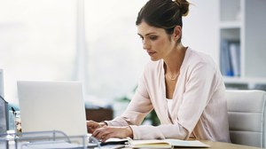 Scientist in front of laptop