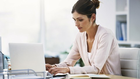 Scientist in front of laptop