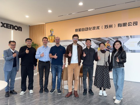 Delegationsmitglieder bei Xenon