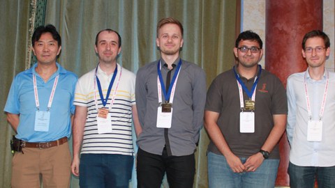 Winners of the ACM SIGCOMM Student Research Competition 2018, where Marcin Nawrocki (middle) won silver.